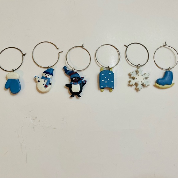 Pier 1 set of winter wine charms on blue and white snowman, sleds and more - Picture 3 of 7